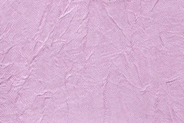 Sfondo ondulato viola chiaro da un materiale tessile. Tessuto con trama piega primo piano . — Foto Stock
