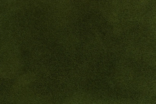 Hintergrund aus dunkelgrünem Wildleder Nahaufnahme. Samt matte Textur aus olivem Nubukleder — Stockfoto
