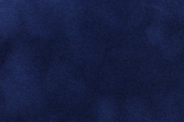 Sfondo di tessuto scamosciato blu scuro primo piano. Tessuto in velluto opaco di nubuck blu navy — Foto Stock