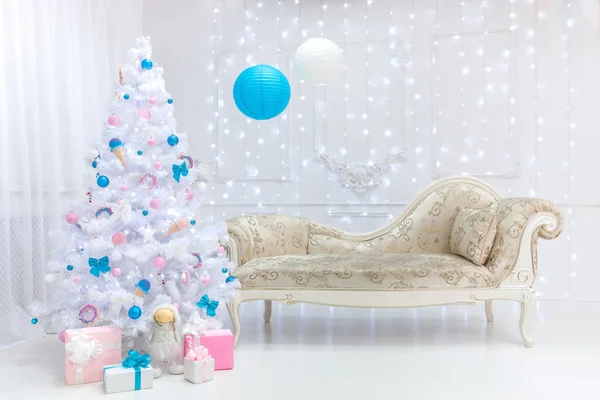 Classic Christmas light interior in white, pink and blue tones with a couch, tree and molding