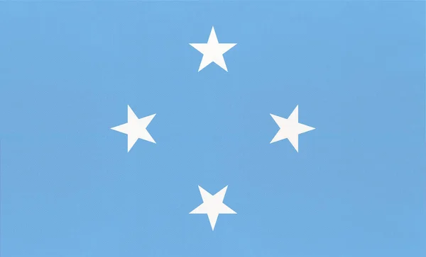 Statele Federate ale Microneziei steag național de țesături, fundal textil . — Fotografie, imagine de stoc