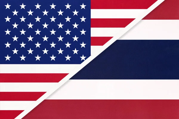 USA vs Kingdom of Thailand national flag from textile. Relationship between two american and asian countries. — Stock Photo, Image
