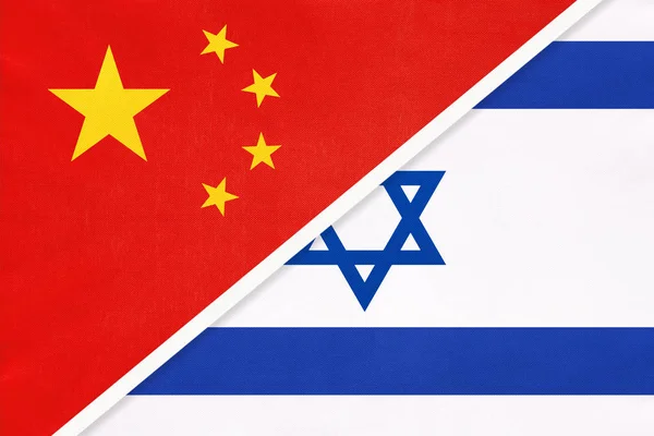 People's Republic of China or PRC vs Israel national flag from textile. Relationship between two asian countries. — Stock Photo, Image