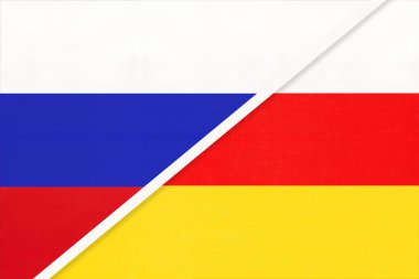 Rusya ya da Rusya Federasyonu Güney Osetya Cumhuriyeti 'ne karşı tekstil ulusal bayrağı. İki Avrupa ve Asya ülkesi arasındaki ilişki, ortaklık ve ekonomi.