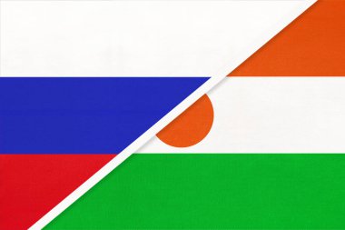 Rusya ya da Rusya Federasyonu Nijer Cumhuriyeti 'ne karşı, tekstilden iki ulusal bayrağın sembolü. Asya ve Afrika ülkeleri arasındaki ilişki, ortaklık ve şampiyonluk.