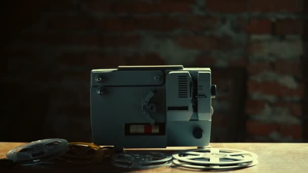 Man Is Getting Ready to Switch Old Movie Projector On — Stok Video