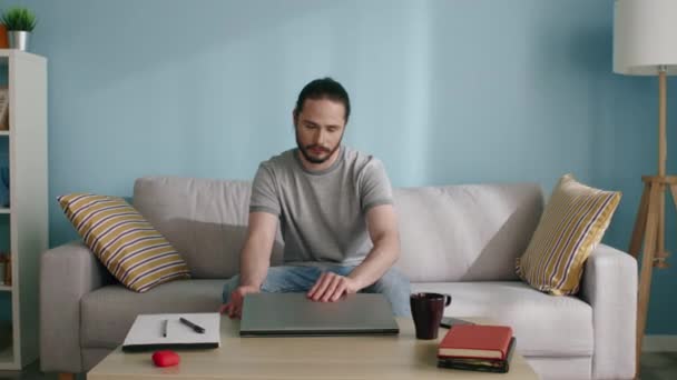 Freelancer Opens Laptop to Deal with Job Tasks — Stock Video