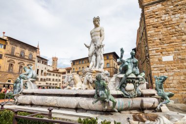 Fragment of Fountain of Neptune on Piazza della Signoria (Signoria square) in front of Palazzo Vecchio in Florence, Toscana region, Italy. clipart