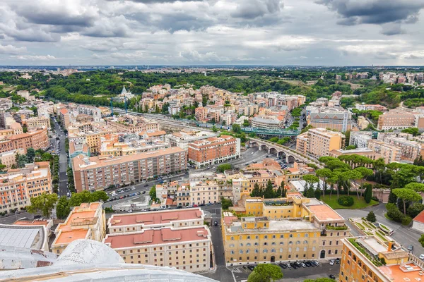 Cloudy view of Vatican and Rome from the top of the dome of St Peter\'s Basilica, Lazio region, Italy.