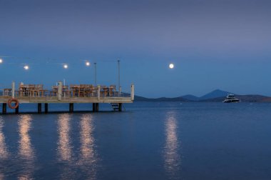 Ortakent, Muğla ili, Tu restoranın pier gün batımı görünümü