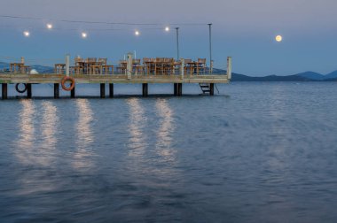 Ortakent, Muğla ili, Tu restoranın pier gün batımı görünümü