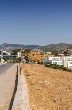 Bodrum ile oldfashioned Tepesi'nden güneşli görünümünü yel, Muğla ili, Türkiye değirmenleri.
