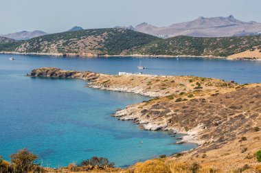 Oldfashioned yel değirmenleri hill Bodrum, Muğla ili, Türkiye'de güneşli görünümünü.