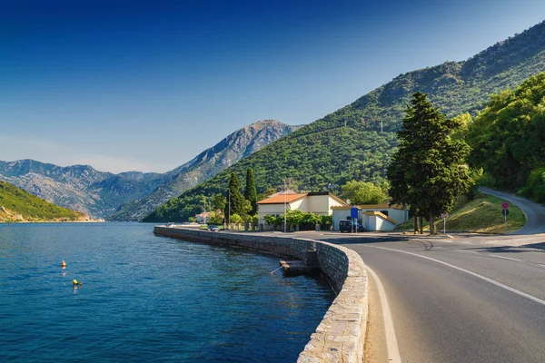 Sunny morning view of Kotor bay and coastal road near Tivat, Mon — Stock Photo, Image