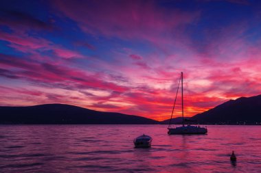 Sunset view of Kotor bay and mountains near Tivat, Montenegro.