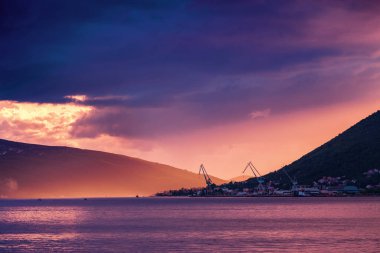 Sunset view of Kotor bay and mountains near Tivat, Montenegro.