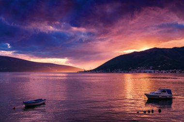 Sunset view of Kotor bay and mountains near Tivat, Montenegro.