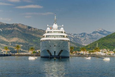 Sunny view of luxury yacht at the port of Tivat, Montenegro.