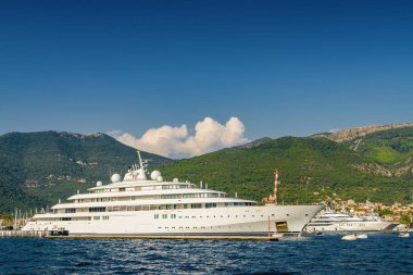 Sunny view of luxury yacht at the port of Tivat, Montenegro.