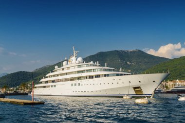 Sunny view of luxury yacht at the port of Tivat, Montenegro.