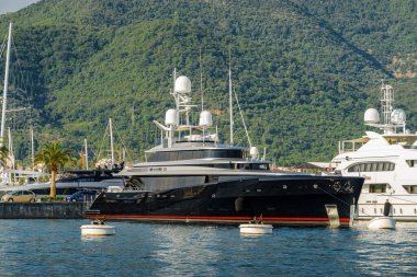 Sunny view of luxury yacht at the port of Tivat, Montenegro.