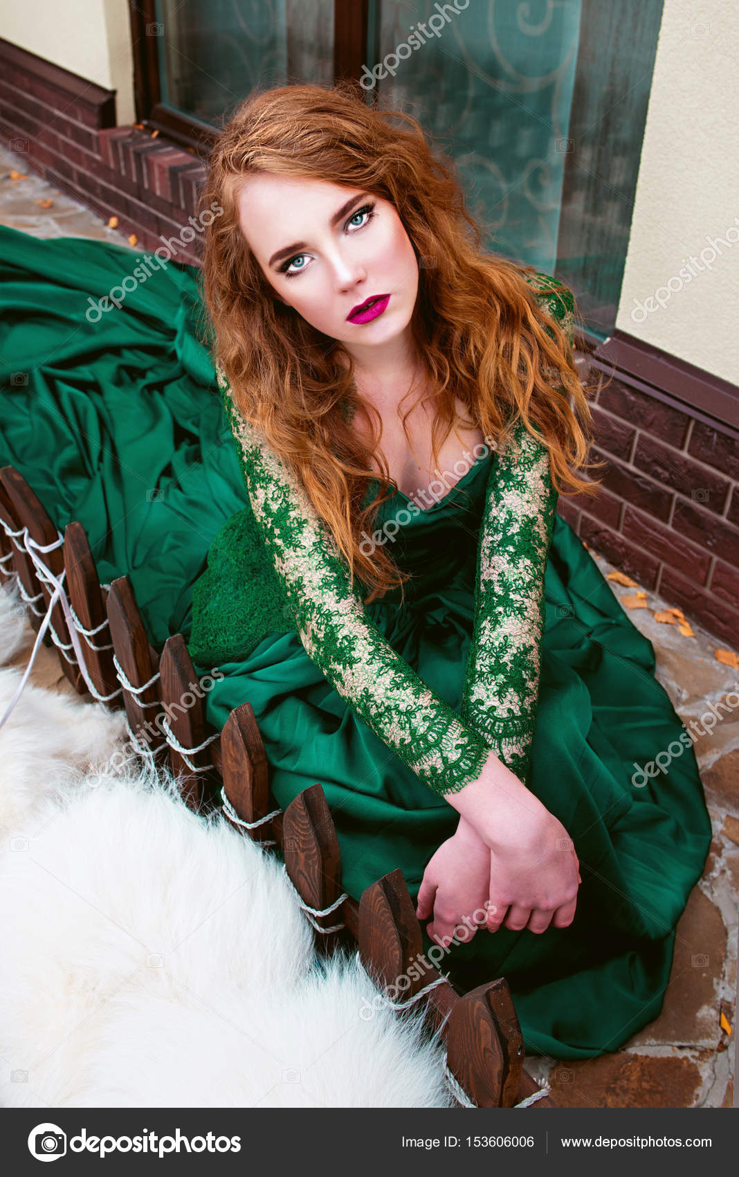 red hair and green dress