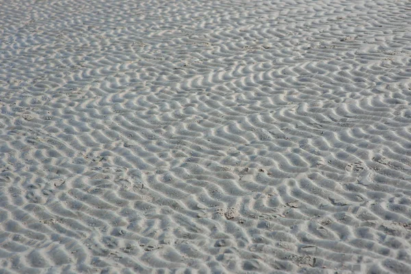 Textura de la arena en la costa — Foto de Stock