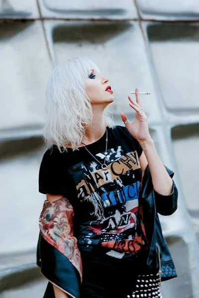 Portrait of stylish blonde grunge young woman