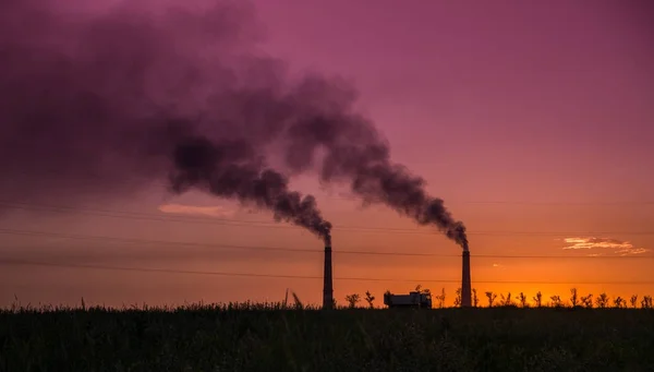 Industrial smoke from chimney at sunset, steppe near Almaty, Kaz — Stock Photo, Image
