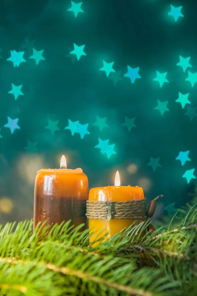 Christmas and new year card with candles, fir branches and star — Stock Photo, Image