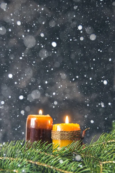 Christmas and new year card with candles, fir branches and snow, — Stock Photo, Image