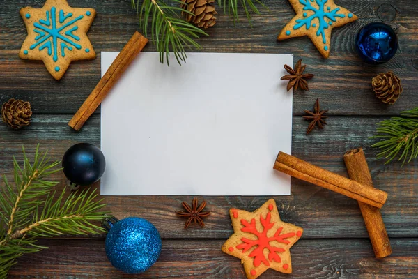 Christmas and new year card with cookies and fir, top view — Stock Photo, Image