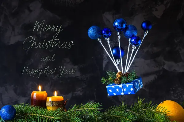 Christmas and new year card with text and blue toys like an air — Stock Photo, Image