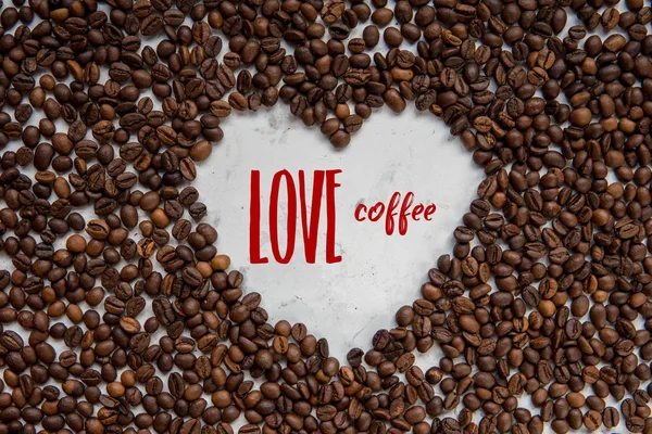 Frame heart from coffee beans with text - Love coffee
