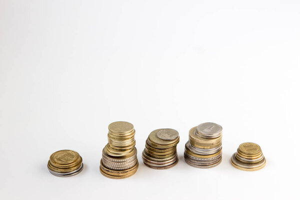 Money coins from multiple countries, copy space