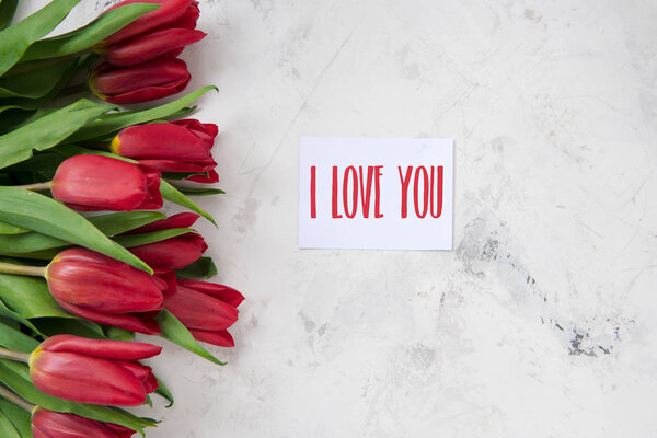 Red tulips with text card I love you