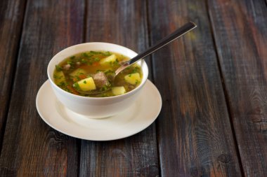 Et, patates ve havuç çorbası. Beyaz bir kase işkembe çorbası, 