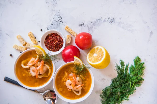 Lentil soup with seafood. Red soup with shrimps and squid — Stock Image Lentil soup with seafood. Red soup with shrimps and squid Stock Photo