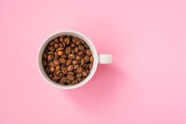 Kahve çekirdekleri bir pembe artalanları tarih alanı Kopyala