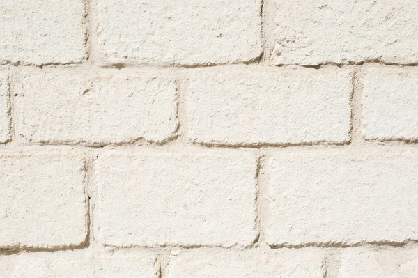 Wand van betonnen blokken verlicht door daglicht — Stockfoto