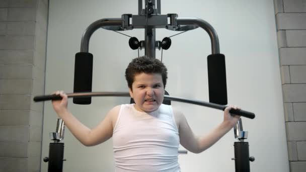 Thick Angry Kid Boy Trains Gym Fat Burning Power Children — Stock Video
