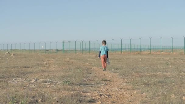 Small Lonely Child Goes State Border Resentful Boy Refugee Settlement — 비디오