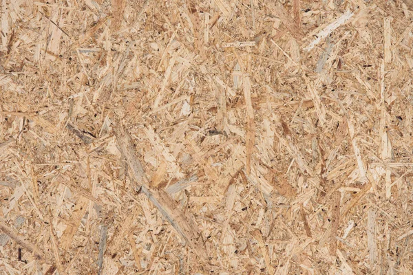 texture of a wooden plate from compressed shavings