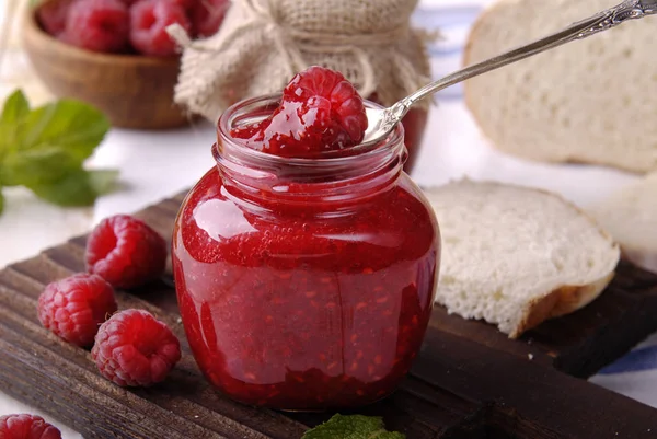 Raspberries and jam. — Stock Photo, Image