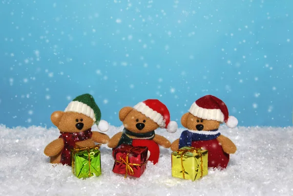 Three little Santa bears.
