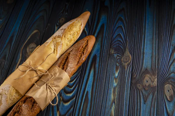 Two Baguettes Wheat Buckwheat Flour Blue Wooden Background — Stock Photo, Image