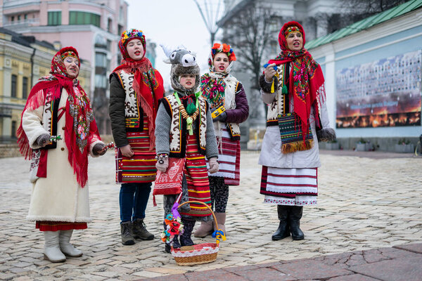 Performance of the Ukrainian folk choir with Christmas songs (carols). Ukraine, Kiev, Mikhailovskaya Square, 01/19/2020.