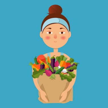 Bir kadın bir gıda sepeti tutuyor. Sağlıklı bir yaşam tarzı kavramı