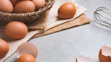 Close up image of organic chicken eggs are one of the food ingredients on the restaurant table in the kitchen to prepare for cookingwith copy space. Organic chicken eggs food ingredients concept