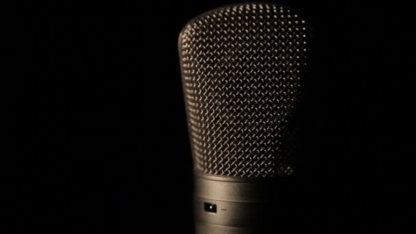 Microphone singer on a black background — Stock Video